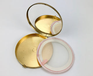 Schiaparelli, Elsa. (1890–1973) [Dalí, Salvador. (1904–1989)] Telephone Dial Powder Compact, ca. 1950s