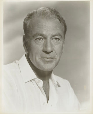Cooper, Gary. (1901-1961) Two Portrait Photographs