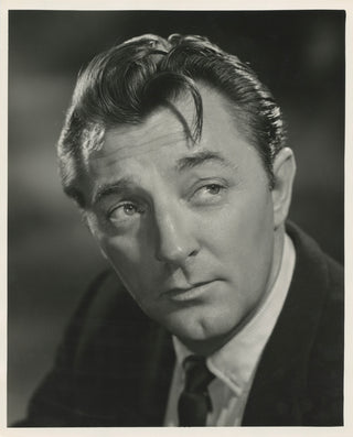Mitchum, Robert. (1917-1997) Portrait Photograph by Swarbricks of London