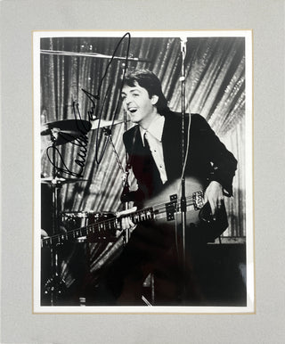 The Beatles. [Lennon, John. (1940–1980)] Group Lot including Secretarial Signed Photos and Silver Coin