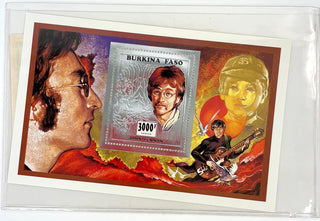 The Beatles. [Lennon, John. (1940–1980)] Group Lot including Secretarial Signed Photos and Silver Coin