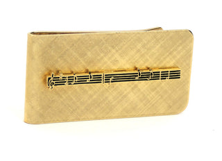 Crosby, Bing. (1903–1977) Music Note Money Clip with Engraved Gift Inscription