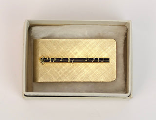 Crosby, Bing. (1903–1977) Music Note Money Clip with Engraved Gift Inscription