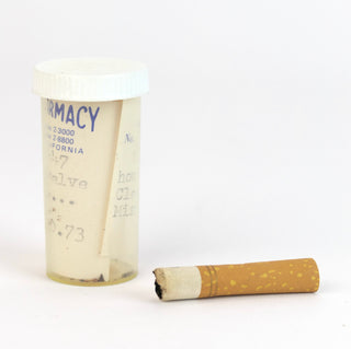[Dietrich, Marlene (1901-1992)] Half-Smoked Cigarette and Pill Bottle - EX-MARLENE DIETRICH