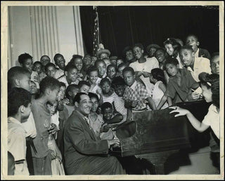 [Jazz & Song] Ellington, Duke. (1899-1974) Vintage Photograph performing for Harlem youth