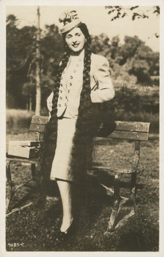 [Barnum & Bailey] Kelter, Hanka. Signed Postcard Photograph of the Long-Haired Circus Star, 1945
