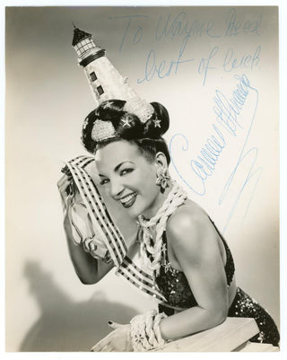 Miranda, Carmen. [Maria do Carmo Miranda da Cunha] (1909 - 1955) Signed Photograph in an Amazing Lighthouse Hat
