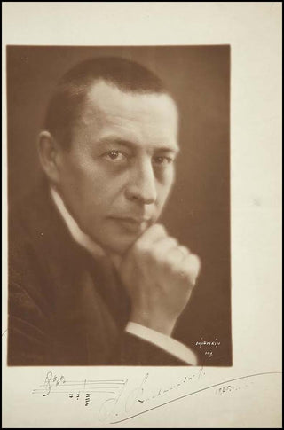 Rachmaninoff, Sergei. (1873–1943) Large Signed Photograph with Autograph Musical Quotation