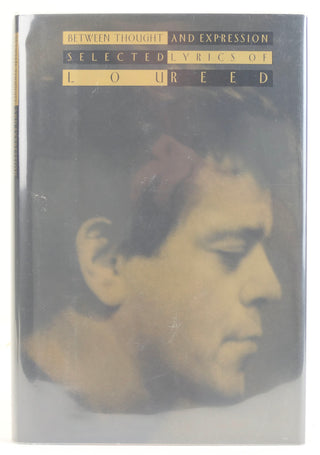Reed, Lou (1942-2013) "Between Thought and Expression: Selected Lyrics of Lou Reed" - Signed First Edition